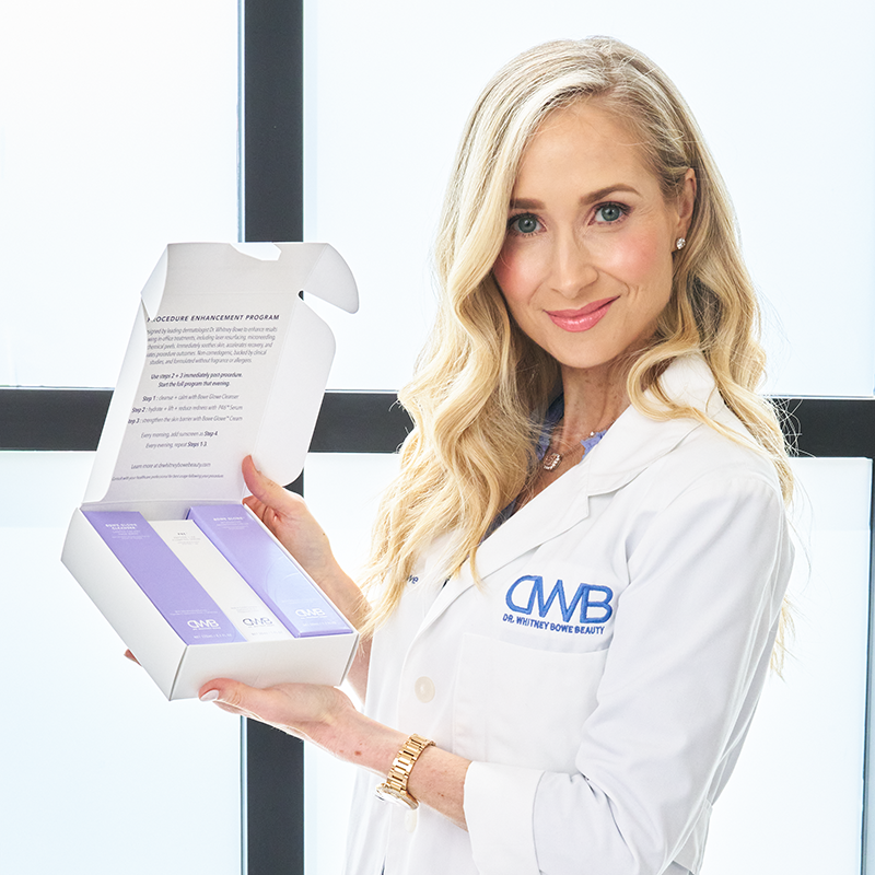 Founder (a woman) in a white lab coat with 'DWB' holding a product packaging box.
