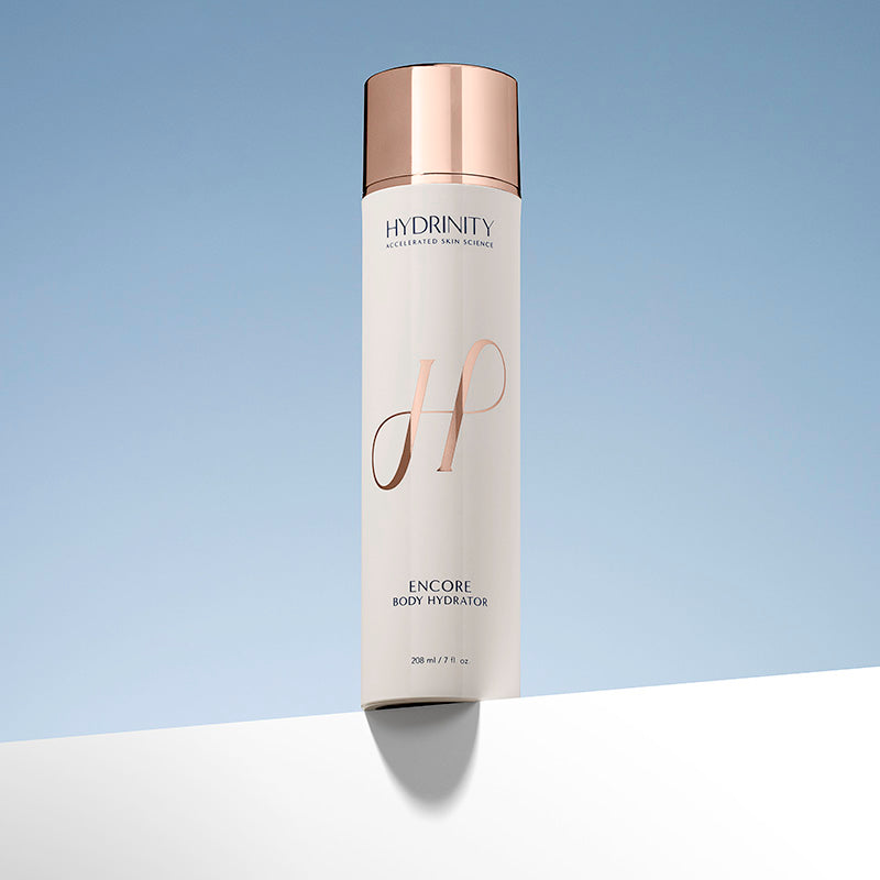 Hydrinity encore body hydrator 208ml/7 fl oz on a two toned background