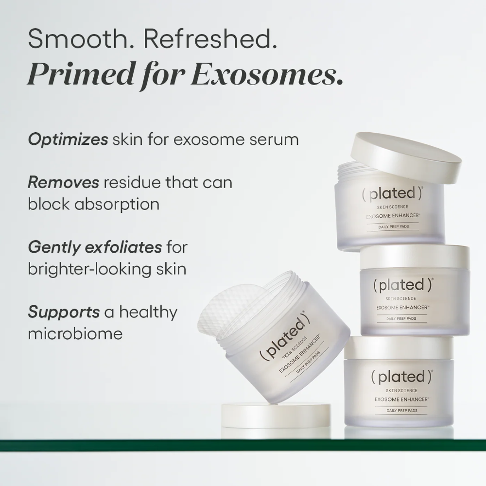 ( plated ) Skin Science, Exosome Enhancer Daily Prep Pads, 50 pads. Four frosted jars stacked on a glass shelf, one open showing a textured cotton pad, beside the text “Smooth. Refreshed. Primed for Exosomes. Optimizes skin for exosome serum. Removes residue that can block absorption. Gently exfoliates for brighter-looking skin. Supports a healthy microbiome.”