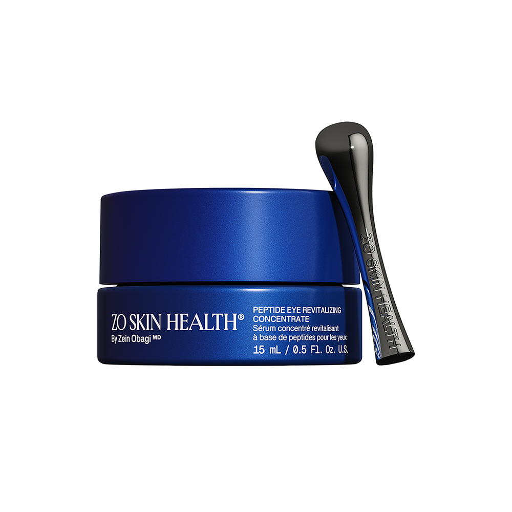 ZO Skin Health, Peptide Eye Revitalizing Concentrate, 15 mL. Blue jar with a metal cooling applicator resting against it.