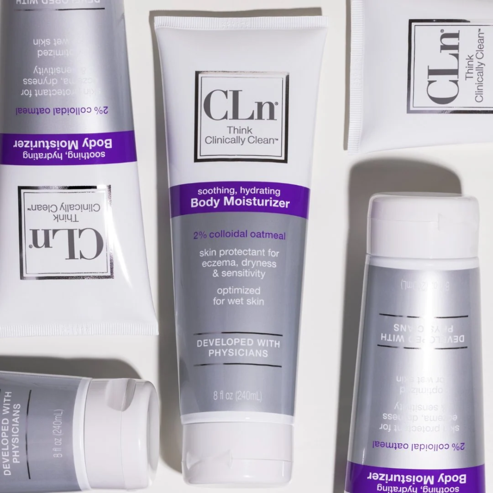 CLn Body Moisturizer 8 fl. oz. tubes arranged flat on a white surface