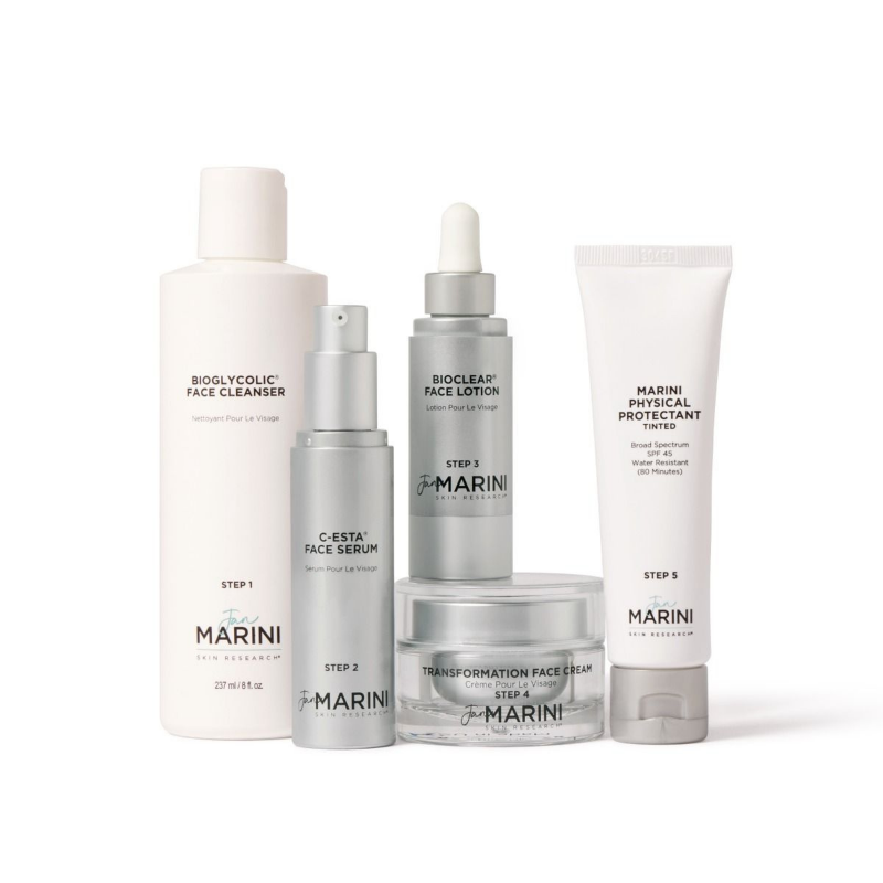 Jan Marini Skincare Management System Normal to Combination including bioglycolic face cleanser, c-esta face serum, bioclear face lotion, transformation face cream, and marini physical tinted sunscreen, spf 45